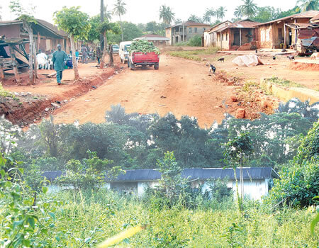 Inside Eti-Oni community. INSET: The community’s clinic which is no longer useful